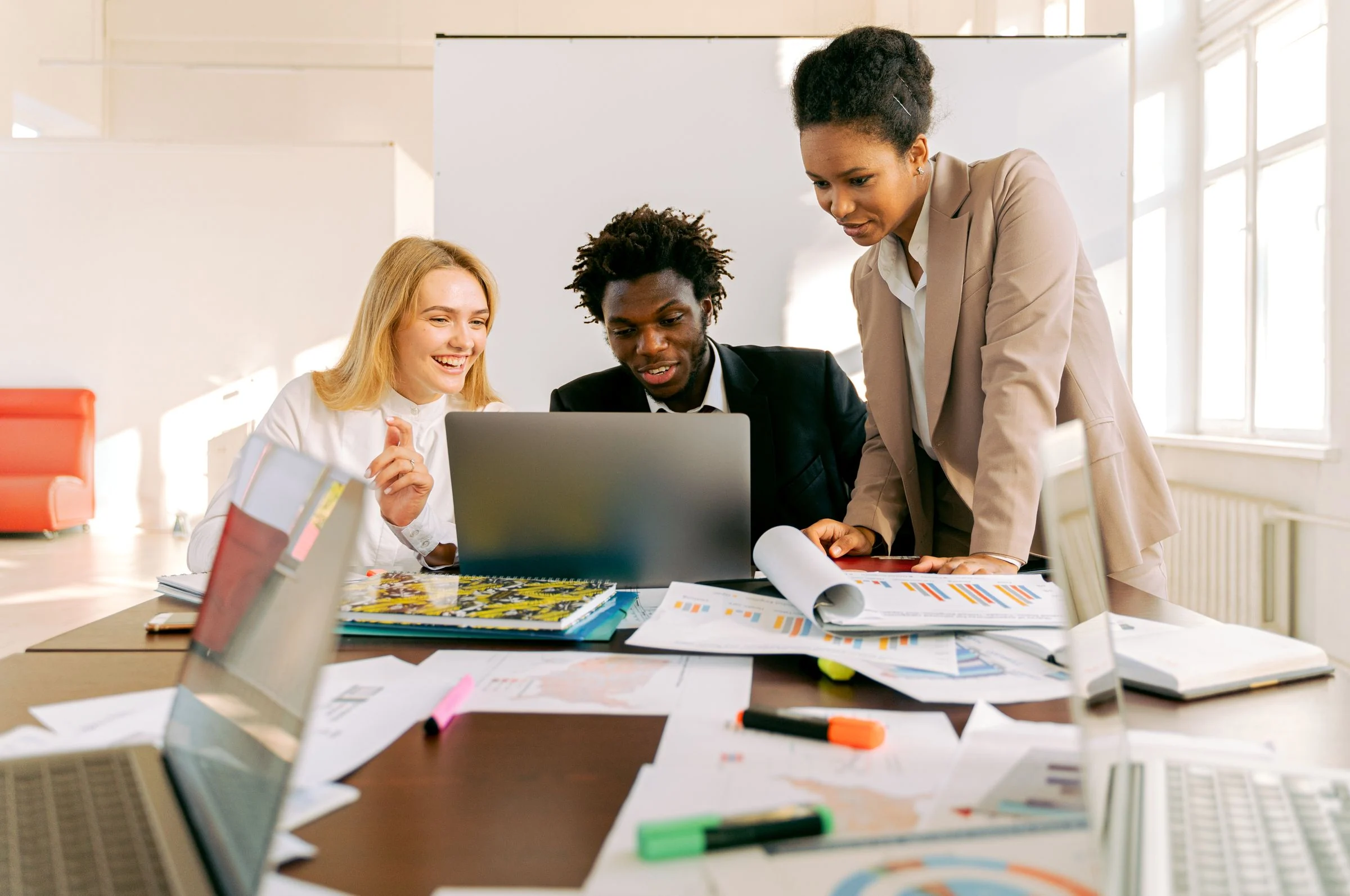 Property professionals collaborating around a table